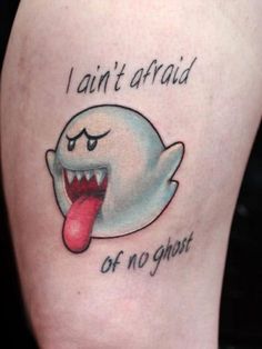 a tattoo with a ghost saying i can't afraid of no ghost