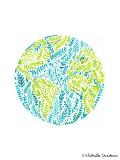 a blue and green plate with leaves on it