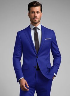 Explore a whole new world of fashion and define your presence in our immaculate Scabal Cobalt Blue Wool Suit. Crafted from pure wool, this blue suit gives off a sense of not only style but also professionalism and competency, earning you an added level of respect. The cobalt blue color will make you feel confident about yourself. Simply team it up with a white formal shirt, printed tie, and polished black shoes to complete this eye-catching look.   Look Includes   Scabal Cobalt Blue Wool Fabric  Two Button Jacket Style  Notch Lapel  Horn Royal Black Buttons  Single Vent  Three Cuff Buttons  Two Welted Back Pockets on Trousers    Click 'Customize Now' to modify the look if needed.   Lining: 100% Viscose, Dry Clean. Professional Blue Workwear Sets, Professional Blue Sets For Workwear, Professional Blue Suit With Notch Lapel, Blue Notch Lapel Set For Workwear, Blue Notch Lapel Set For Work, Blue Three-piece Suit For Business Casual, Blue Professional Three-piece Suit For Semi-formal Occasions, Blue Wool Suits For Workwear, Blue Wool Suits For Work