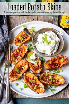 loaded potato skins on a plate with mashed potatoes