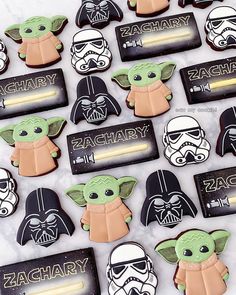 star wars cookies are arranged on a table