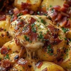 chicken and potatoes with bacon in a skillet