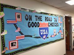 a bulletin board on the wall that says on the road to choices usa with pictures and words