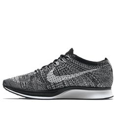 The Nike Flyknit Racer 'Oreo 20' is a sleek and stylish sneaker that is perfect for any activity. Its Flyknit upper is lightweight, flexible and durable, while its black and white colorway provides a bold and eye-catching look. The Phylon midsole and Nike Zoom Air cushioning provide a comfortable and responsive ride. The Flyknit Racer is part of the iconic Nike Flyknit series, which is inspired by the natural form of the human foot. This sneaker is perfect for running, walking, or just casual we Nike Zoom Air, Nike Flyknit Racer, Flyknit Racer, Marathon Running Shoes, Nike Flyknit, Running Shoes Sneakers, Nike Air Zoom, Nike Zoom, Stylish Sneakers