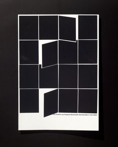 a black and white photo with squares in the middle on a dark background that appears to have been cut into smaller rectangles