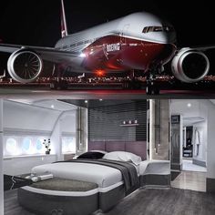 an airplane that is sitting on the ground at night and in front of a bed