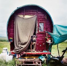 a horse trailer with a tarp over it