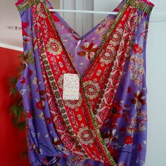 Boho Chic From Free People. V-Neck, Lovely Back As Well. Never Worn, Tags Still Attached. Original Price $78. Easy To Care For Nylon, Spandex Mix. Purple V-neck Beach Top, Lavender V-neck Top For Vacation, Purple V-neck Top For Vacation, People Cutout, Free People Tank Top, Floral Bodysuit, Patchwork Top, Striped Long Sleeve Tee, Boho Lace