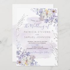 a wedding card with watercolor flowers on the front and back, in purple tones