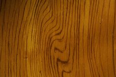 closeup of wood grains on the surface of a wooden table or flooring