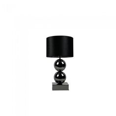 a table lamp with two balls on it and a black lampshade over the base