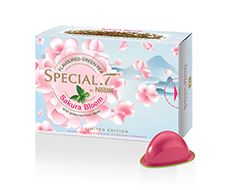 a box of soap next to a pink shoe on a white surface with the word special written in it