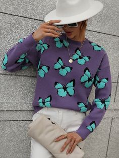 Our butterfly knit top comes in a dark purple base with turquoise butterfly embroidered. Your go-to chilling buddy while relaxing in the aroma of scented candles in a romantic ambience, this jumper is designed with a classic crew collar, long relaxed sleeves. Match it with our casual ankle boots or trendy cowgirl boots! Size Guide: Ambre is 5’2” tall, and has a 33.2” bust, 24.5”waist, & 36.7” hips. She is wearing a S / US 4 / AU 8. This top is true to size. Feature: Long relaxed sleeves. Crew ne Butterfly Sweater, Legging Sport, Sleeves Clothing, Long Sleeve Knit Sweaters, Self Design, Everyday Dresses, Dress Cuts, Printed Sweater, Sleeves Pattern