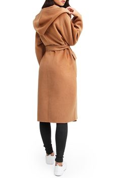 Completed with a hood, the Runaway Wool Blend Robe Coat is our functional take on this new winter key item. To be worn at your leisure, wide open or closed, this coat will do the job with its warm and cosy styling. . Large hood. Patch pockets. Self tie belt. Oversized fit. Double brushed wool, no lining . Approx. 43.25" length (size S). Imported Dry clean 60% Wool, 40% Polyester The Runaway, Tie Belt, Oversized Fits, Wool Blend, Fur Coat, Trench Coat, Dry Clean, Nordstrom, Key