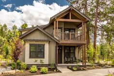 a house in the woods with lots of trees