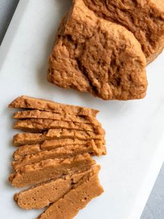 some crackers are sitting on a white plate