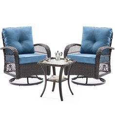 two wicker chairs and a table with blue cushions on white backround background