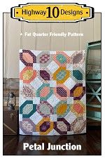 a book cover with a quilt on it and the title, petal junction 10 designs