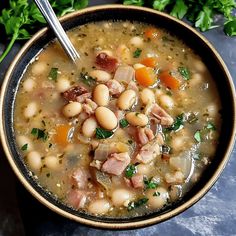 a bowl filled with ham and bean soup