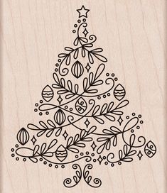 a wooden stamp with a christmas tree on it