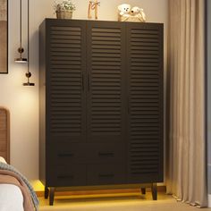 a bedroom with a large brown cabinet next to a bed