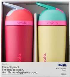 two pink and blue insulated water bottles in a cardboard box with the words owala printed on it