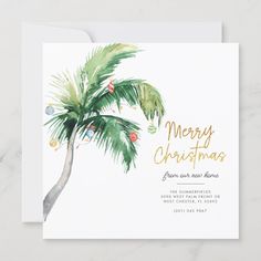 a christmas card with a palm tree on it