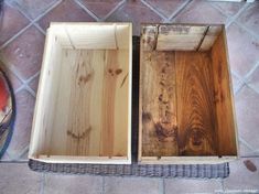 two wooden boxes sitting on top of a tile floor