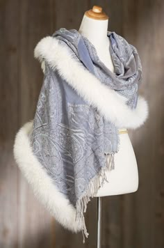 Generously edged in Canadian blue fox fux, this warm yet lightweight shawl goes with casual or evening clothes for a fine fashion finish. Free shipping   returns. Fox Clothes, Clothes Details, Fantasy Clothing Aesthetic, Ice Outfit, Dnd Winter Clothes, Dress Ideas, Fur Cape, Winter Shawl, Fur Shawl