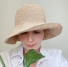 Our wide brim raffia hat crochet of paper rope yarn. It`s natural fiber - cellulose Floppy bucket hat is soft, but sturdy, flexible, light weighted, foldable and washable! Trendy sun hat is a great handmade gift for women any age. more crochet bucket hat here https://etsy.me/3GyieCJ our colorful crochet bags here https://etsy.me/3mXZ93a Main photo shows straw yellow floppy hat Sizes: 6⅞, 7, 7⅛ US, (XS, S, M) for head circumference 22`` (55-57 cm) 7¼, 7⅜ US, (L, XL) for head circumference 23`` (58-59 cm) XXL for big head (60-61 cm) CARE: hand washable in water 40 C. Dry flat. Special designs can be created by combining different colors according to the customer's specifications. Custom orders are welcome! Crochet summer panama produced and packed in non-smoking, pet free studio. Real item c Natural Woven Fedora, Natural Wide Brim Toquilla Straw Bucket Hat, Wide Brim Natural Woven Bucket Hat, Natural Woven Wide Brim Bucket Hat, Wide Brim Woven Bucket Hat In Natural, Straw Crochet Hats, Casual Crochet Hat With Short Brim In Natural Color, Casual Natural Crochet Hat With Short Brim, Natural Straw Bucket Hat With Curved Brim