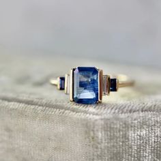 Blue Emerald Cut Sapphire Ring | $3,700 | Available at Gem Breakfast Wide Band Diamond Rings, Emerald Cut Sapphire Ring, Blue Emerald, Blue Engagement Ring, Hand Rings, Blue Gemstone Rings