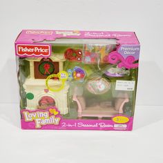 a pink toy house with furniture and accessories in it's box on a white surface