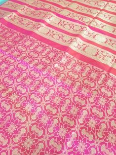 This Banarasi handloom pure silk lehenga is a perfect festive/wedding/occasional wear it enhanced with pink color motifs.  Occasion: party wear/wedding  Materials. Pure silk. Unstich lehenga  Fabric design - Banarasi  lehenga  Pattern: paisley/buti motifs.  Borders: yes  Border type: Zari  Zari type: golden zari  Fabric length with blouse and with dupatta.  Borders is 6.5 meters  Blouse: 0.85 Meters  No of kali: 18 Size of kali 42 inch  No of border in dupatta 9 Pink Anarkali Set With Cutdana For Festivals, Pink Cutdana Anarkali Set For Festivals, Pink Traditional Wear With Zari Work, Pink Traditional Wear For Wedding And Festivals, Pink Dola Silk Traditional Wear With Zari Work, Traditional Pink Sharara With Pallu, Pink Dola Silk Traditional Drape Wear, Pink Lehenga With Zari Work For Traditional Ceremonies, Pink Sharara For Traditional Ceremonies