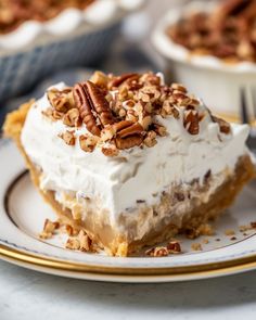 a piece of pecan pie on a plate with a fork