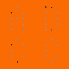 an orange background with black dots on it