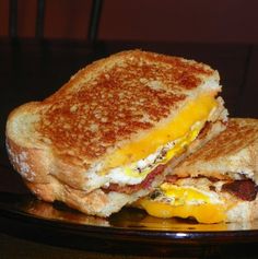 a grilled cheese and egg sandwich on a plate