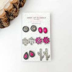 Set Of Six | Western Themed Fuchsia Pink and Silver Tone Stud Earrings. Pictured on a white background with a wood piece in the top left corner. Silver Western Earrings, Pink Western Jewelry, Silver Western Style Earrings, Pink Earrings Studs, Pink Western Earrings, Western Earrings, Giddy Up Glamour, Sale Items, Silver Tone