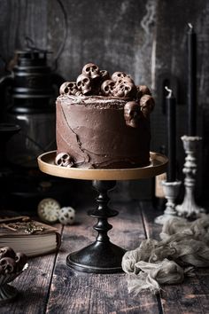 a chocolate cake sitting on top of a wooden table