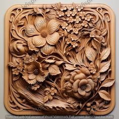 an intricate carved wood panel with flowers and leaves