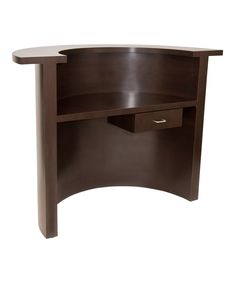 the corner desk has an open drawer on it's left side, and is dark brown