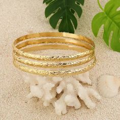 This Trio Bangle Bracelet Features A Beautiful Traditional Hawaiian Flower And Scroll Design. Each Bracelet Is Approximately 5.5-6mm Wide. Available In A Variety Of Sizes. Makes A Beautiful Gift For Mom, Sister, Daughter, Niece Or A Lovely Gift For Yourself Elegant Stackable Beach Jewelry, Elegant Yellow Gold Beach Bracelets, Gold Stackable Beach Jewelry, Gold Stackable Jewelry For Beach, Gold Stackable Jewelry For The Beach, Hawaiian Bracelets, Hawaiian Flower, Floral Bracelet, Hawaiian Flowers