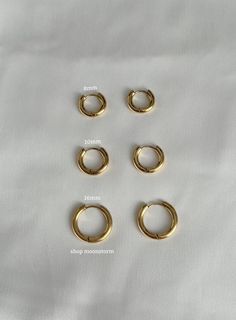 These essential huggies are so stunning on and match everything. An absolute essential in every jewelry collection. Model is wearing size 16mm hoops! - Stainless steel - Water resistant - Will not rust or tarnish - Select desired size (8mm, 10mm, 16mm) - Photos are shown from smallest to largest hoops (top to bottom) Cheap Small Hoop Huggie Earrings, Cheap Small Hoop Metal Earrings, Affordable Handmade Small Hoop Huggie Earrings, Cheap Small Hoop Minimalist Earrings, Cheap Small Hoop Huggie Earrings For Gifts, Cheap Simple Small Hoop Huggie Earrings, Earing Mm Size, Cheap Tiny Hoop Earrings As Gift, Cheap Internally Threaded Small Hoop Huggie Earrings