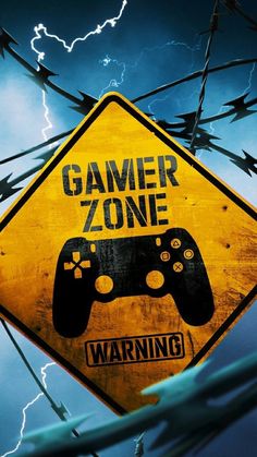 a warning sign with a video game controller on it that says,'gamer zone '