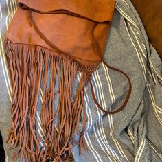 Free People Bag, Raquel Saddle Crossbody, Leather, Suede, Fringe, Hippie, Brown Orange Bag. Never Used. Brown Fringe Pouch Shoulder Bag, Brown Fringe Pouch Bag, Travel Fringe Clutch Bag, Travel Clutch Bag With Fringe, Brown Suede Bag, Free People Bags, Mountain Style, Suede Bag, Suede Fringe