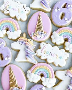 decorated cookies with unicorns, rainbows and clouds