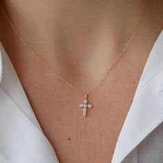 The Prong Set Diamond Cross Necklace sparkles with pear and round diamonds in prong settings resting on our classic cable chain. Designed to hang close to your heart, this cherished symbol holds deep meaning. Cross Diamond Necklace, Diamond Necklace Simple, Statement Engagement Ring, Diamond Cross Necklace, Diamond Bar Necklace, Sparkly Things, Deep Meaning, Diamond Cross, Birthstone Bracelets