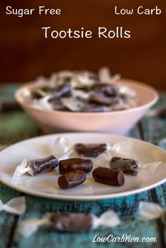 there is a white plate with chocolate candies on it