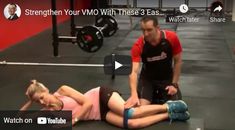 a woman laying on the ground with her leg up next to a man who is holding a barbell