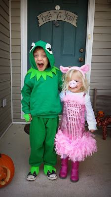 two children dressed up in costumes for halloween