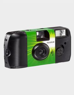 a green and black camera on a white background